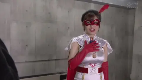 Asian Duo in Red Mask and White Costume