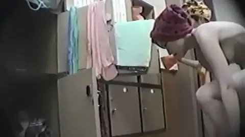 Asian Girls Changing Clothes in Locker Room