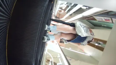 Asian Couple Shopping Together