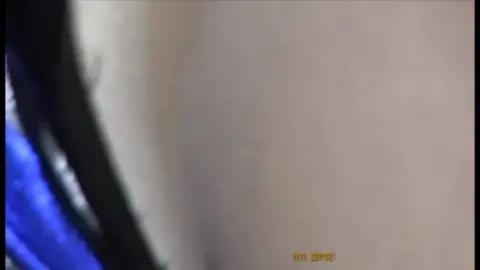 Asian Girl Posing at Car Show