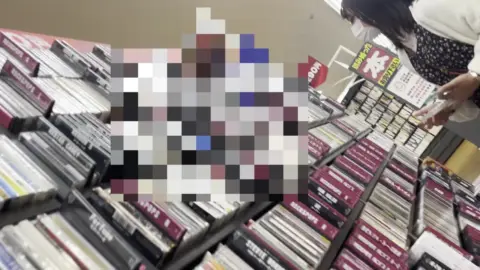 Library Browsing and Intimate Moment