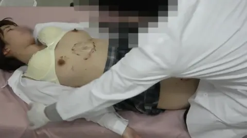 Asian Couple Intimate Bedroom Encounter