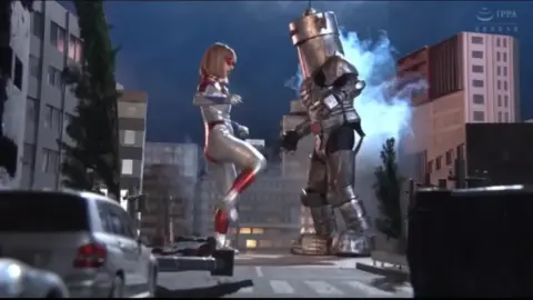 Blonde Asian Girl Fights Robot in City Street