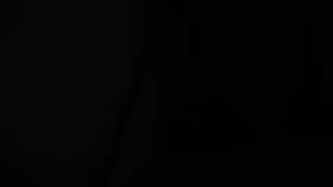 Asian Teen Plays VR on Leather Couch