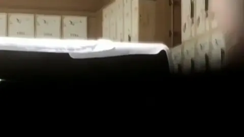 Asian Girl Undressing in Locker Room