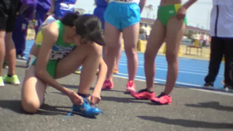 Asian Girls Running in Athletic Wear