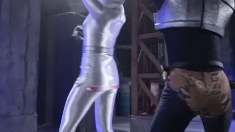 Asian Performers in Costumes and Masks Engage in Explicit Acts