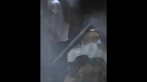 Asian Girl Shopping in Clothing Store