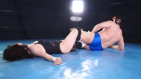 Asian Lesbians Wrestling in Ring