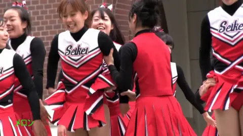 Asian Teen Cheerleaders Outdoor Stunts