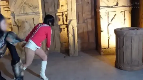 Asian Couple Fights in Ancient Temple Ruins