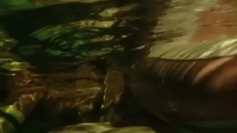 Pregnant Asian in Bathtub