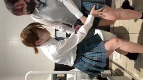 Schoolgirls Intimate Bathroom Encounter