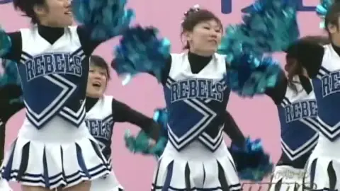 Asian Cheerleaders in Colorful Uniforms