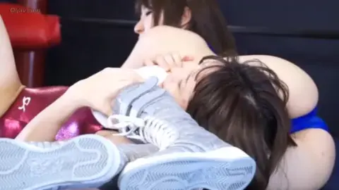 Asian Lesbians Wrestling in Ring