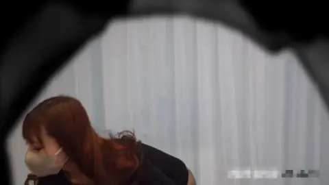 Asian Medical Exam Close-Up