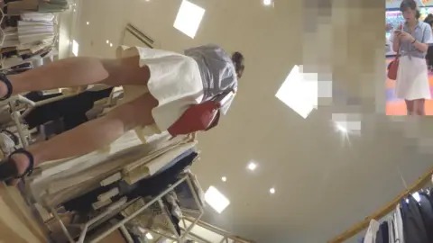 Asian Girls Masturbating in Clothing Store