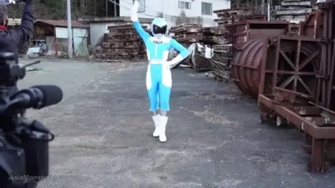 Asian Women in Costumes Engage in Action Sequences