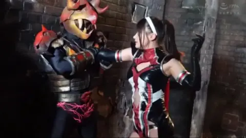 Asian Performers in Costumes Engage in Intimate Scenes