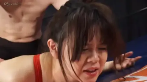 Asian Couple Wrestling in Sexy Outfits