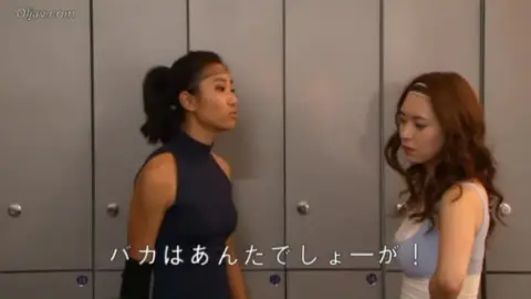 Asian Women Wrestling in Ring