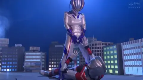 Asian Lesbians in Costume on Rooftop at Night