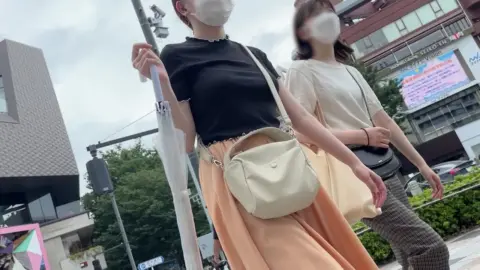 Asian Girls Walking City Street