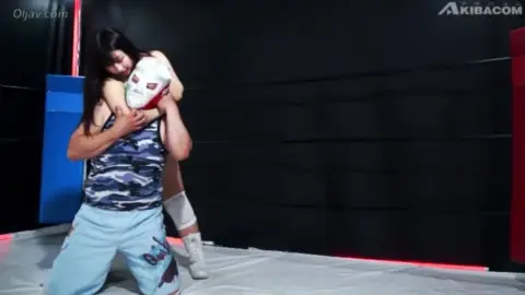 Asian Wrestlers in Luchador Mask and Sports Bra