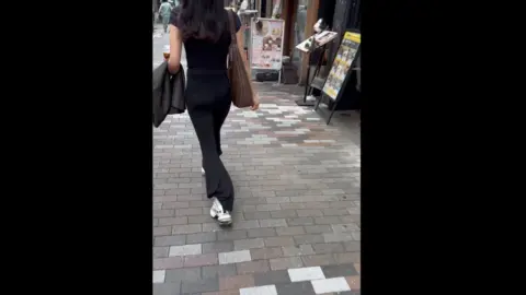 Asian Girl Walking in Public Places