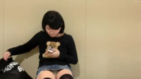 Asian Teen in Black Stockings