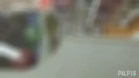 Asian Girl Playing with Beach Balls