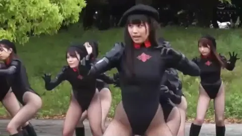 Asian Women in Black Bodysuits Outdoor Dance