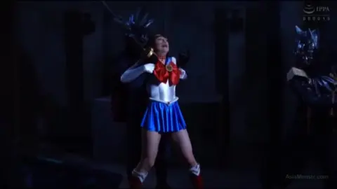 Asian Cosplay Duo in Sailor Fuku