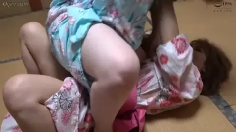 Asian Lesbians Intimate Moment on Tatami Mat