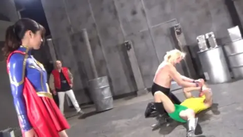 Asian Girl Fights Muscular Men