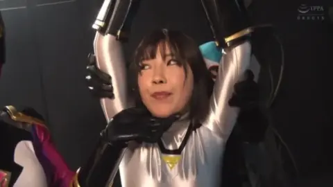 Asian Performer in Silver Costume