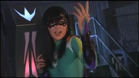 Asian Performers in Neon Stage Show