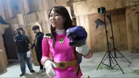 Asian Superheroine in Ancient Temple