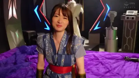 Asian Duo in Fantasy Costumes