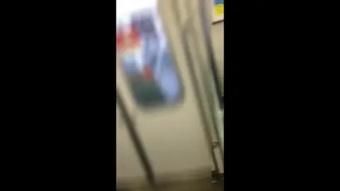 Asian Couple Intimate Moment on Train