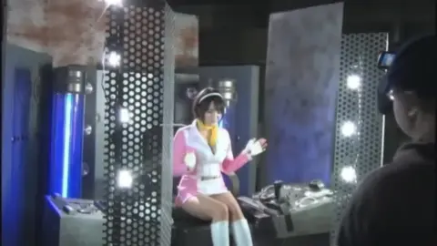 Futuristic Asian Duo in Sci-Fi Costumes