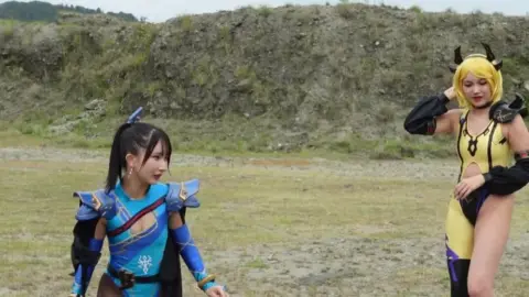 Asian Cosplay Girls in Armor Outdoor Encounter