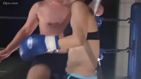 Asian Couple Boxing in Ring