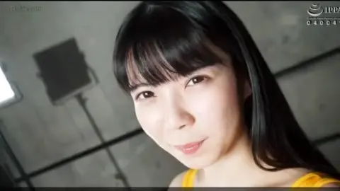 Asian Couple Engaging in Intimate Acts