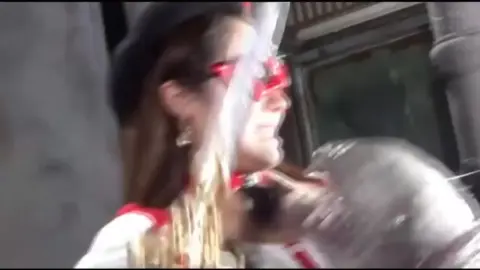 Woman Wields Sword in Erotic Encounter