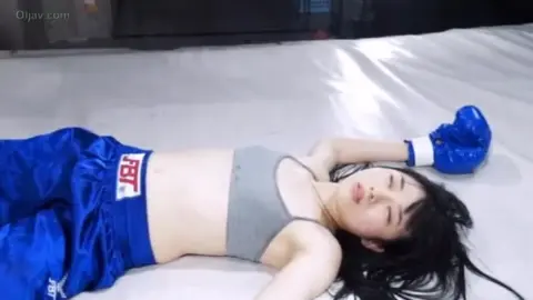 Asian Women in Boxing Ring Encounter