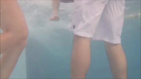 Asian Couples Poolside Intimacy