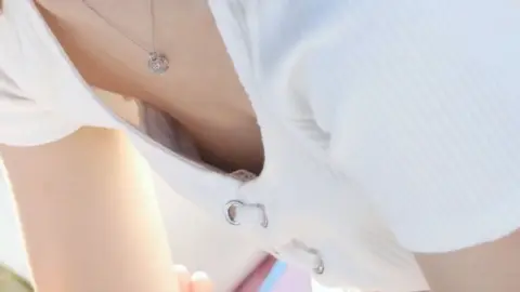 Asian Girl Relaxing in Park