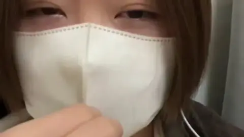 Asian Girl with Face Mask and Vibrator