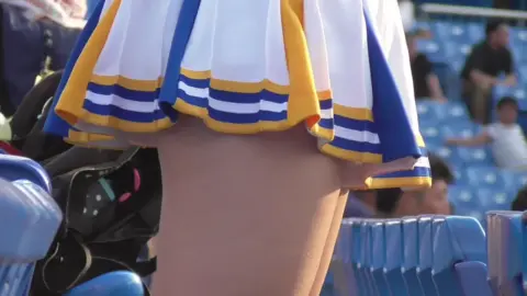 Asian Cheerleader in Stadium